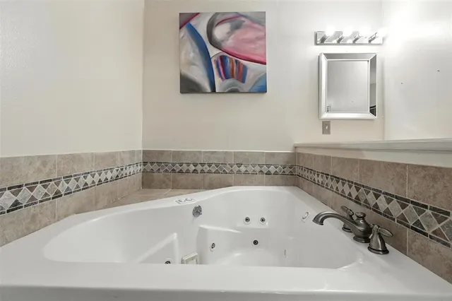 a bathroom with a bathtub