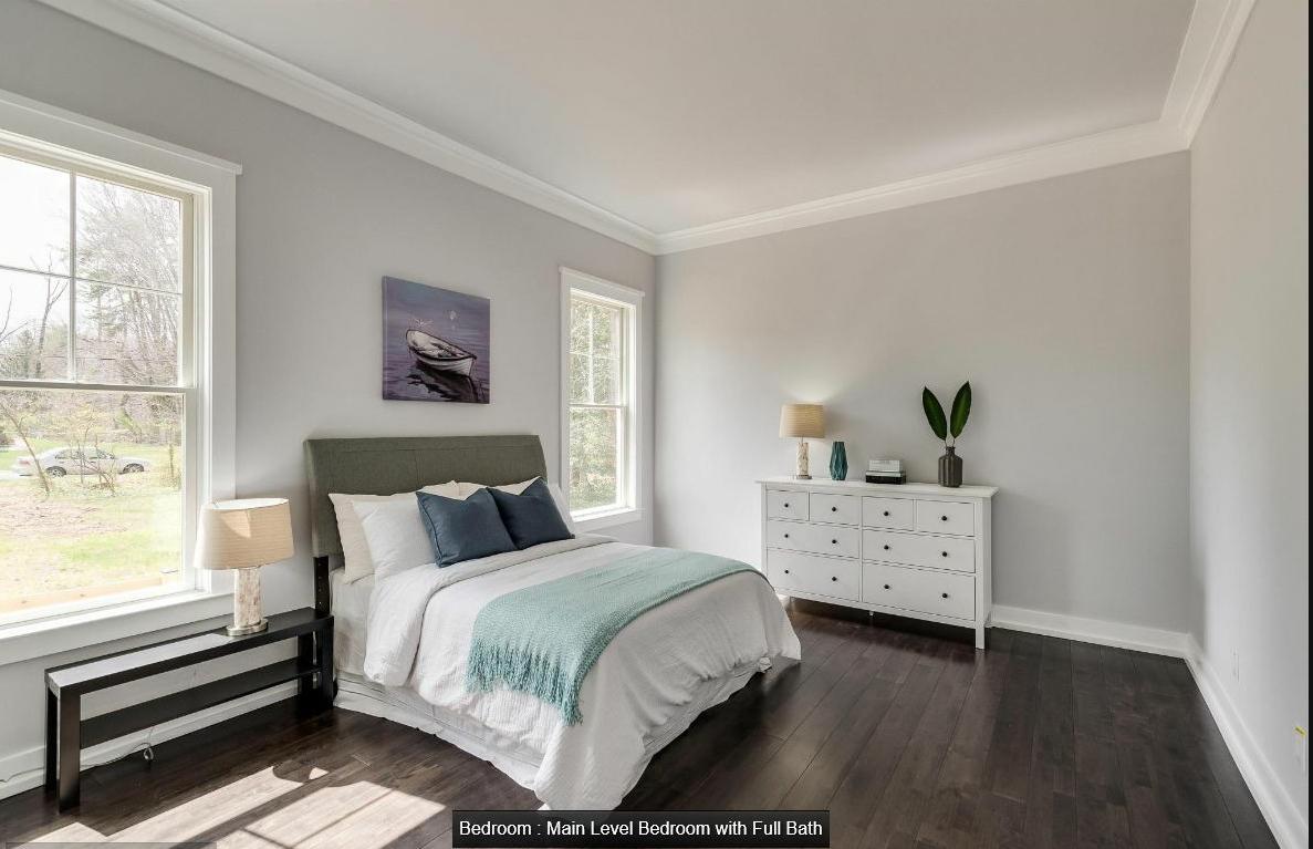 9814 Fernwood Road Bethesda, MD 20817 - Photo 16 of 31 Bright and airy main level bedroom with en suite.