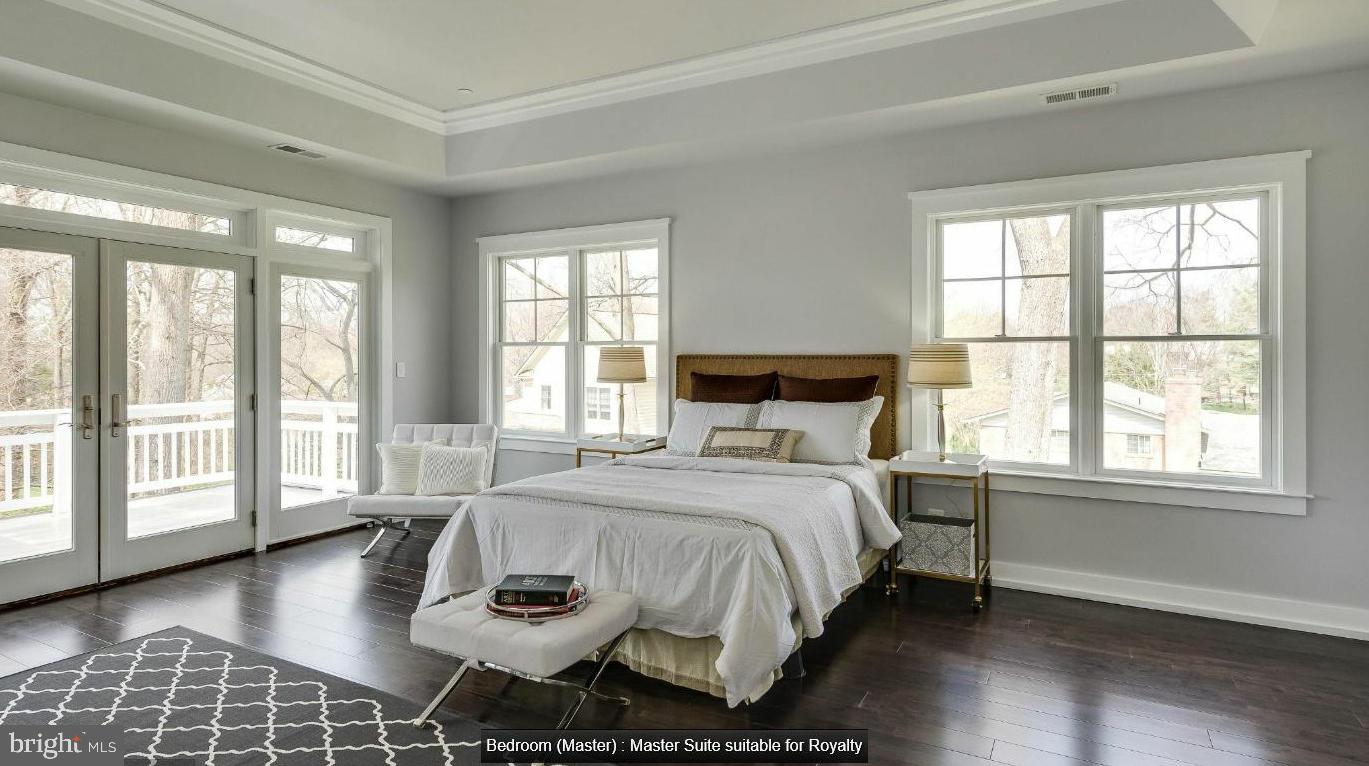 9814 Fernwood Road Bethesda, MD 20817 - Photo 19 of 31 Serene master suite with nature views.