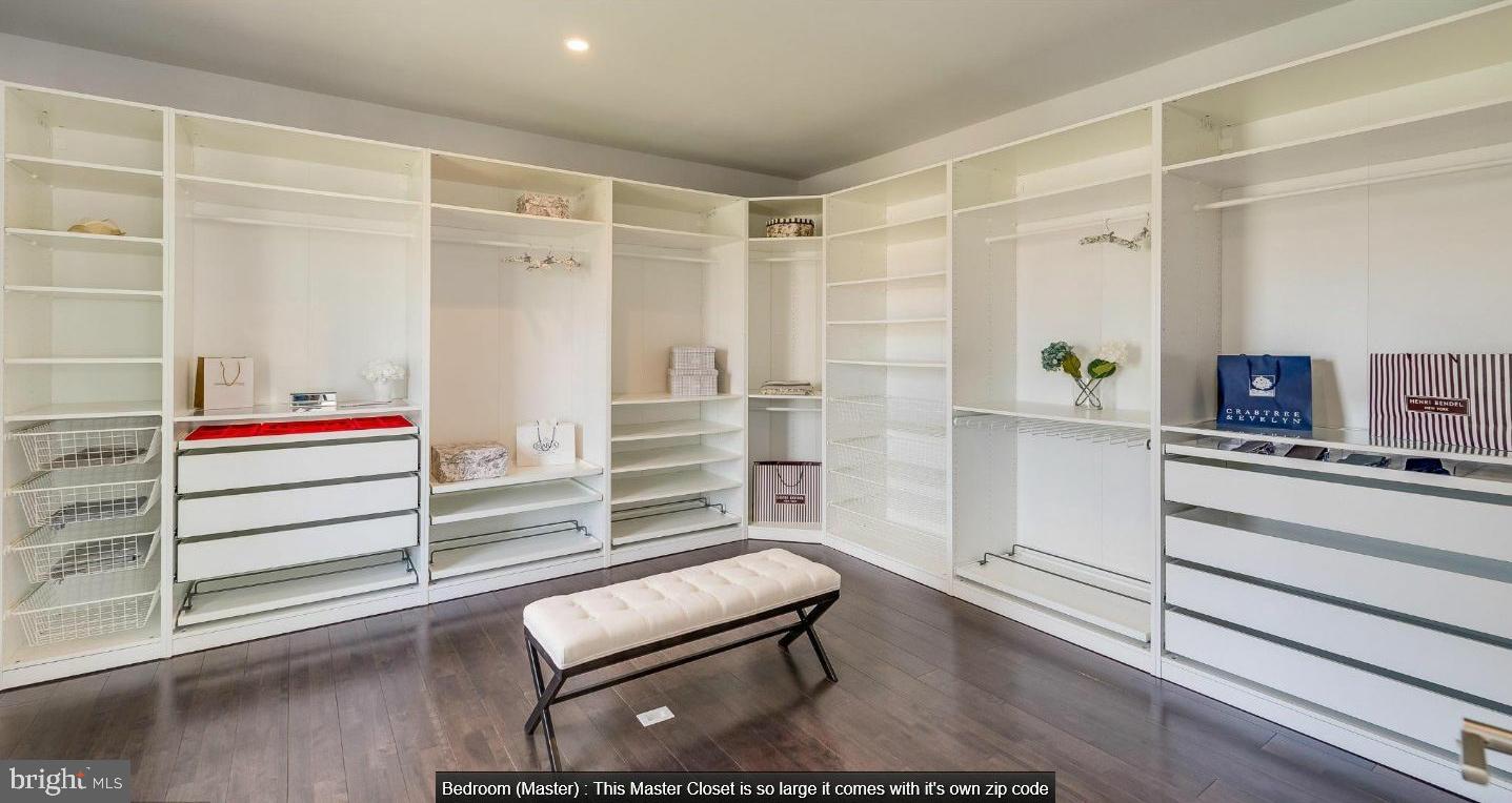 9814 Fernwood Road Bethesda, MD 20817 - Photo 20 of 31 Spacious, elegant master closet design.