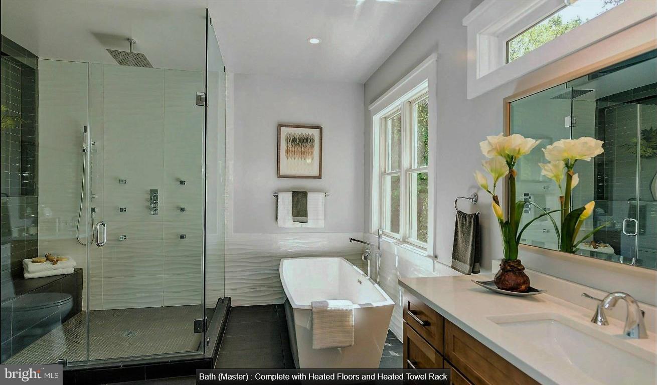 9814 Fernwood Road Bethesda, MD 20817 - Photo 21 of 31 Elegant master bath with modern finishes.