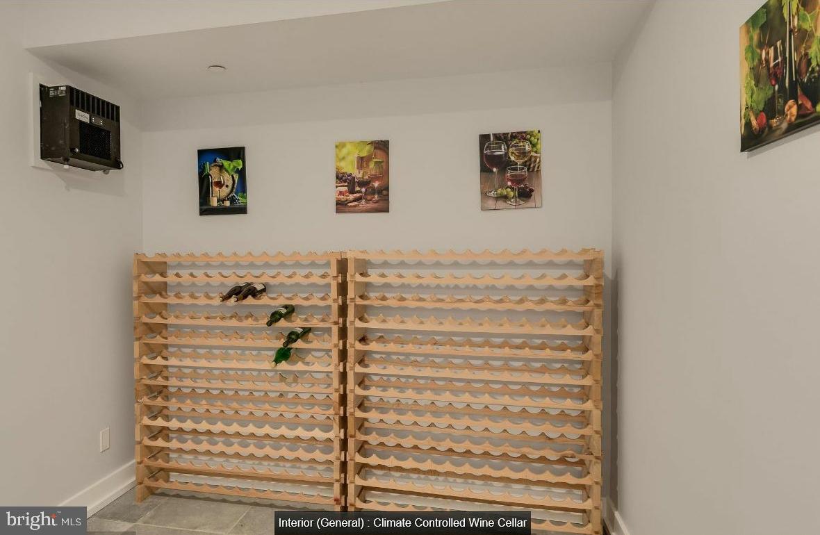 9814 Fernwood Road Bethesda, MD 20817 - Photo 29 of 31 Chic climate-controlled wine cellar.