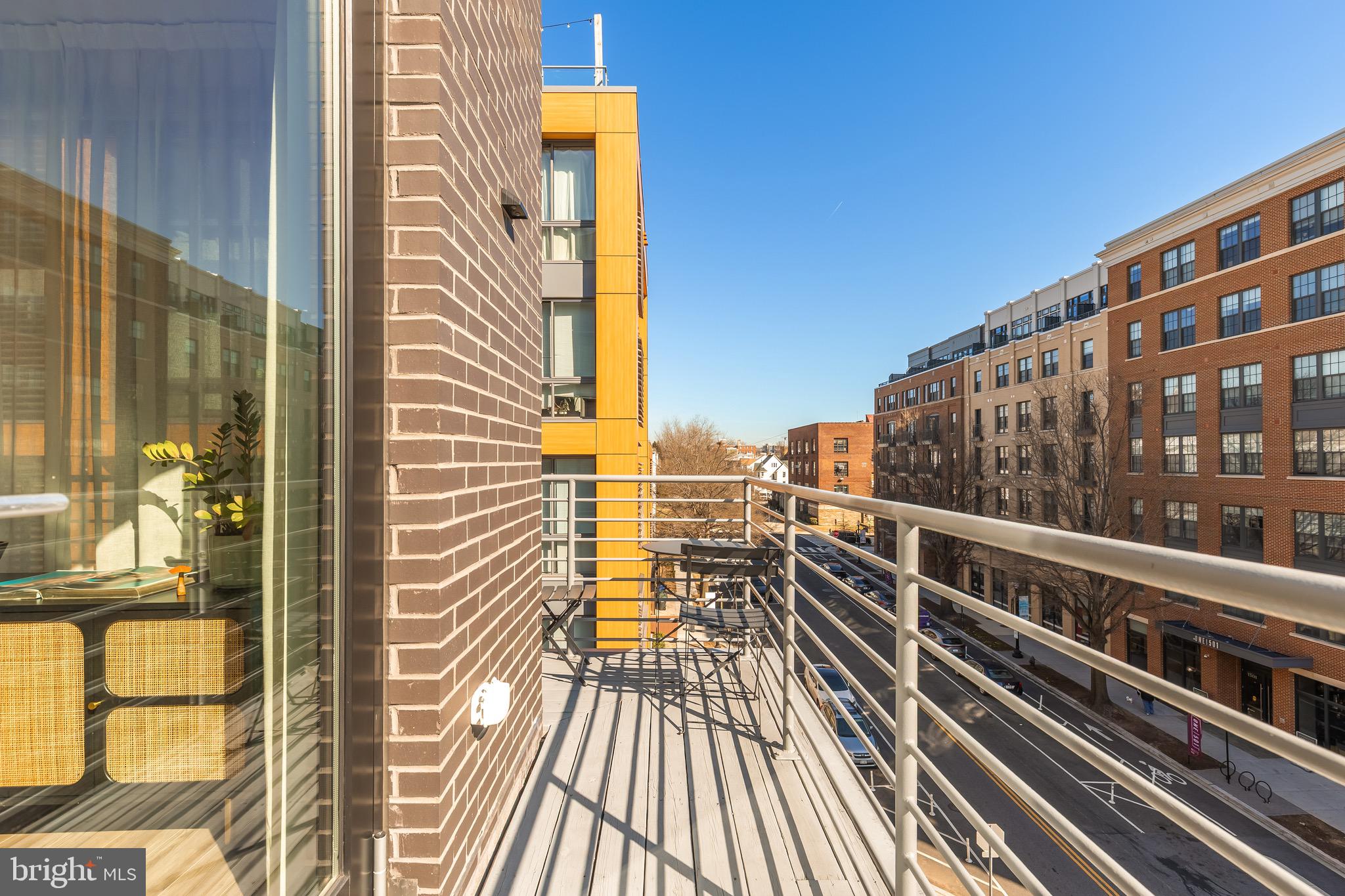 1500 Harry Thomas Way Northeast, Unit 501 Washington, DC 20002 - Photo 16 of 44 a view of balcony with wooden floor