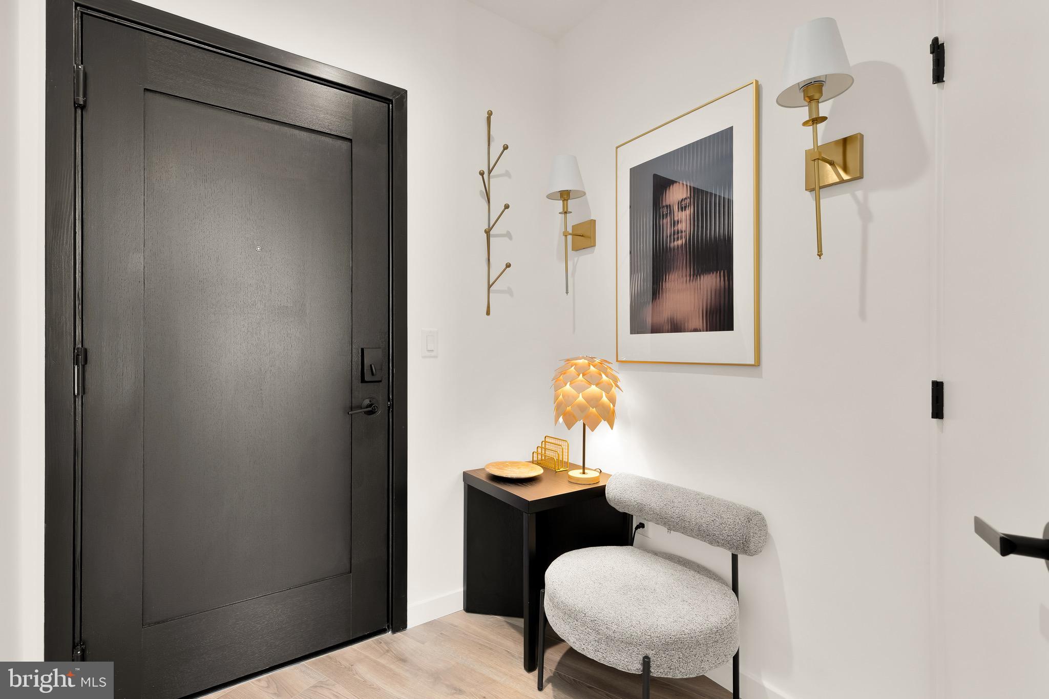 1500 Harry Thomas Way Northeast, Unit 501 Washington, DC 20002 - Photo 2 of 44 a bathroom with a sink mirror and toilet