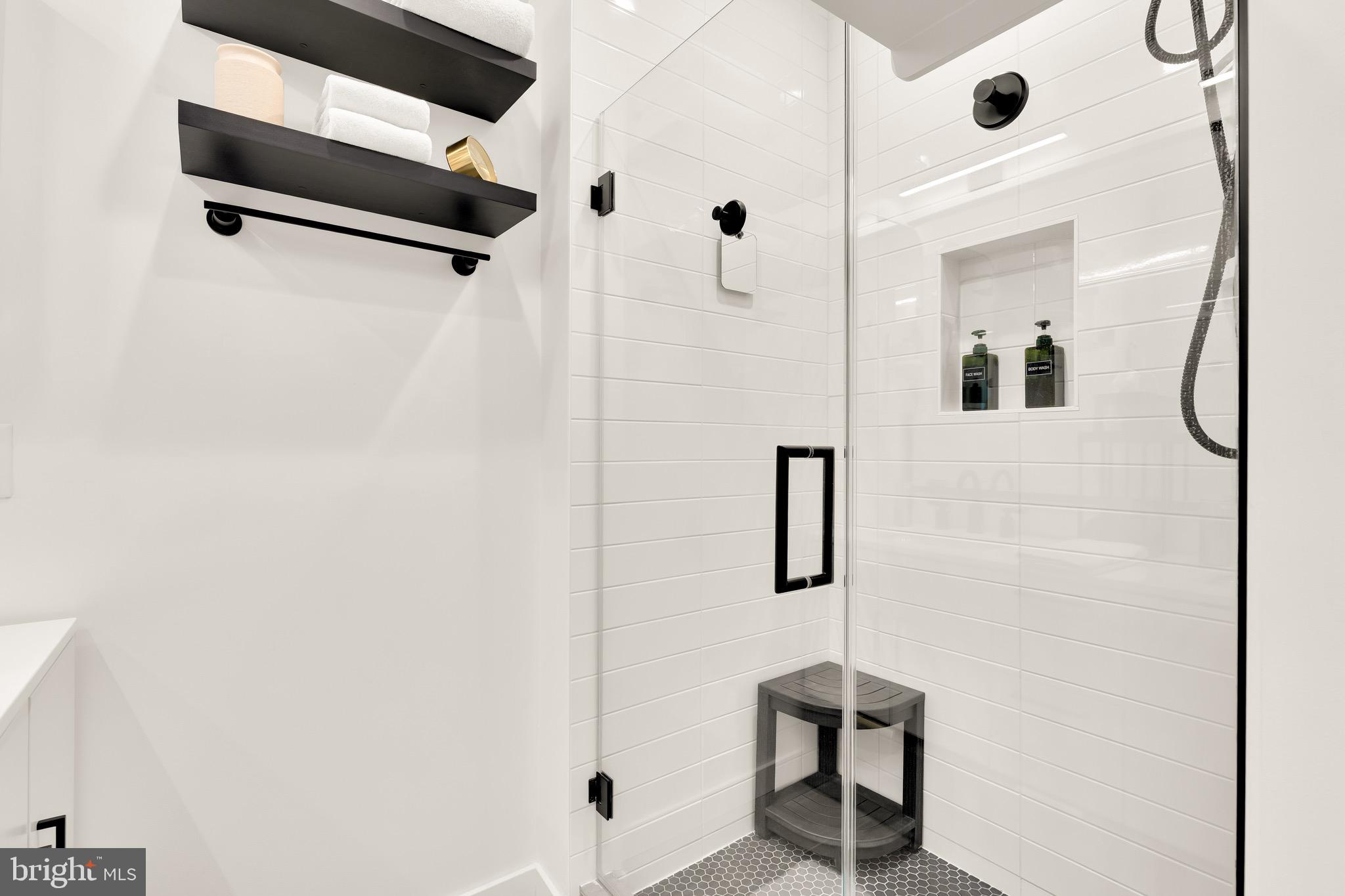 1500 Harry Thomas Way Northeast, Unit 501 Washington, DC 20002 - Photo 30 of 44 a bathroom with a shower