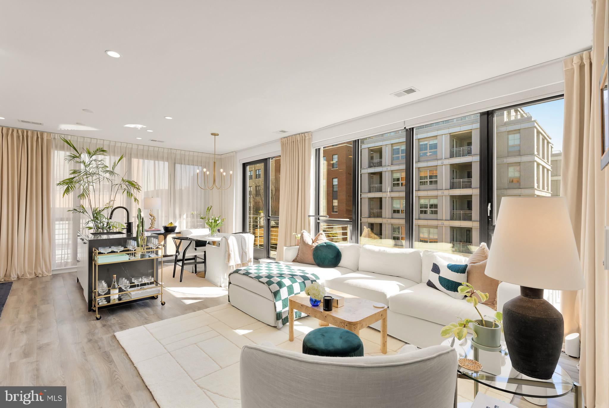 1500 Harry Thomas Way Northeast, Unit 501 Washington, DC 20002 - Photo 3 of 44 a living room with furniture and large windows