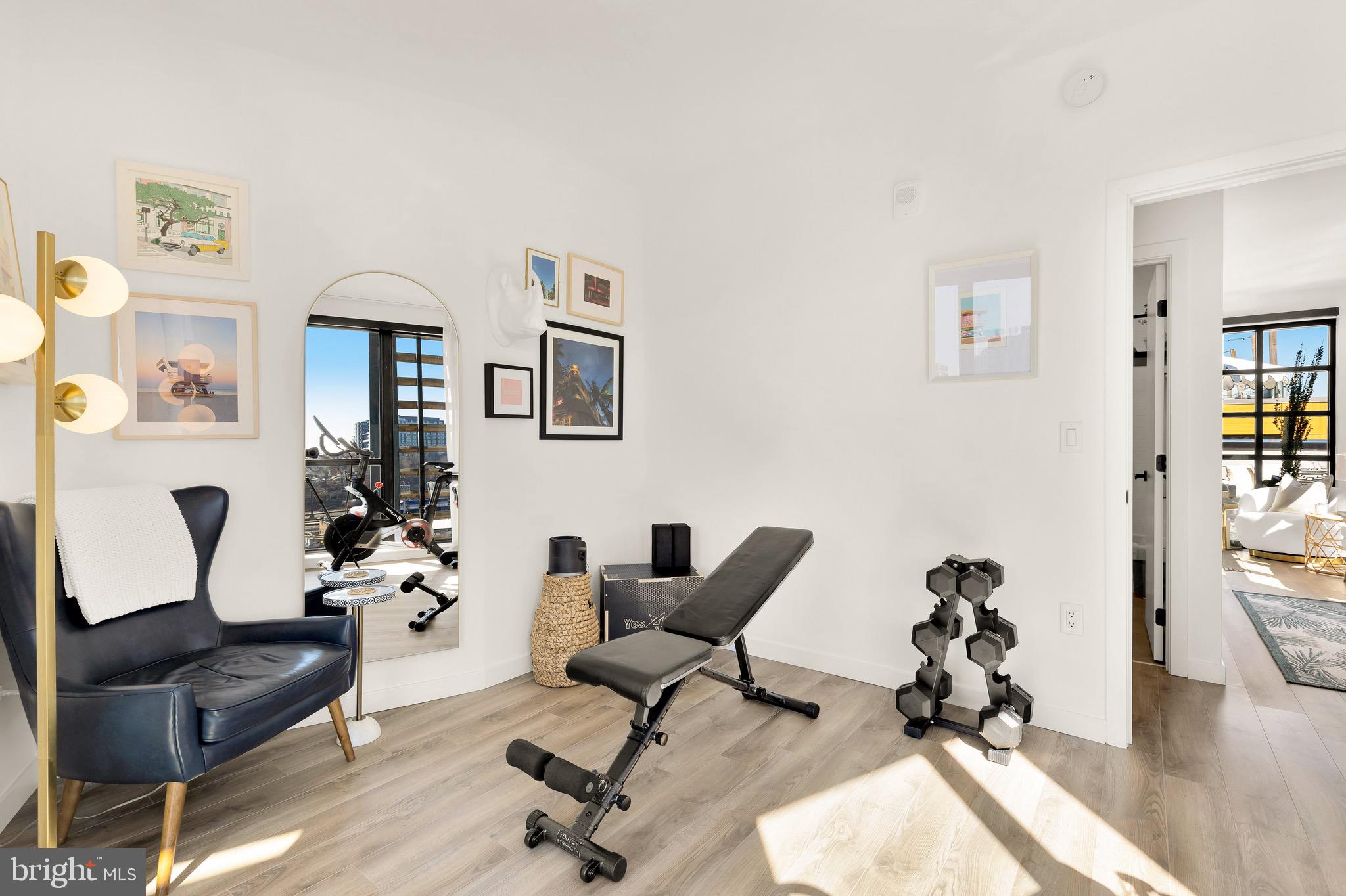 1500 Harry Thomas Way Northeast, Unit 501 Washington, DC 20002 - Photo 32 of 44 a living room with furniture and a wooden floor