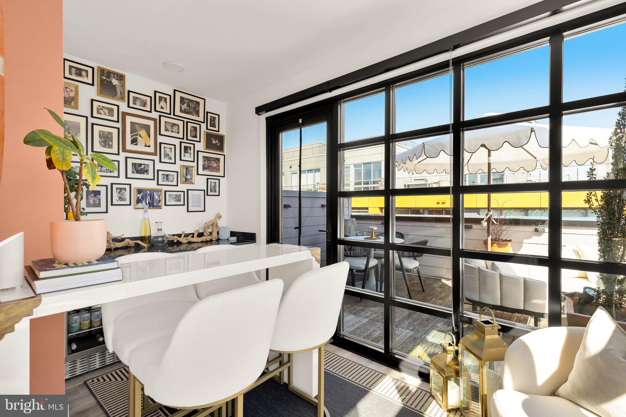 1500 Harry Thomas Way Northeast, Unit 501 Washington, DC 20002 - Photo 34 of 44 a dining room with furniture window and wooden floor