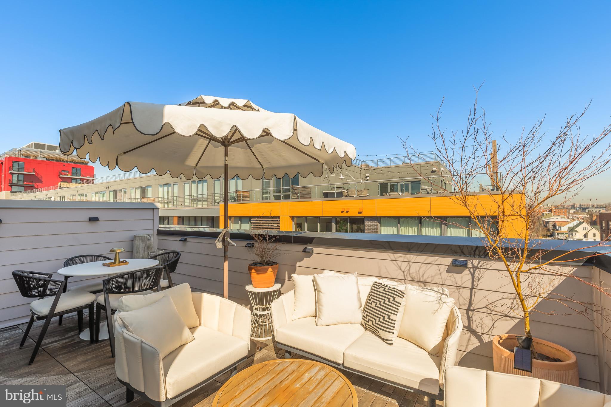 1500 Harry Thomas Way Northeast, Unit 501 Washington, DC 20002 - Photo 38 of 44 a view of swimming pool with outdoor seating