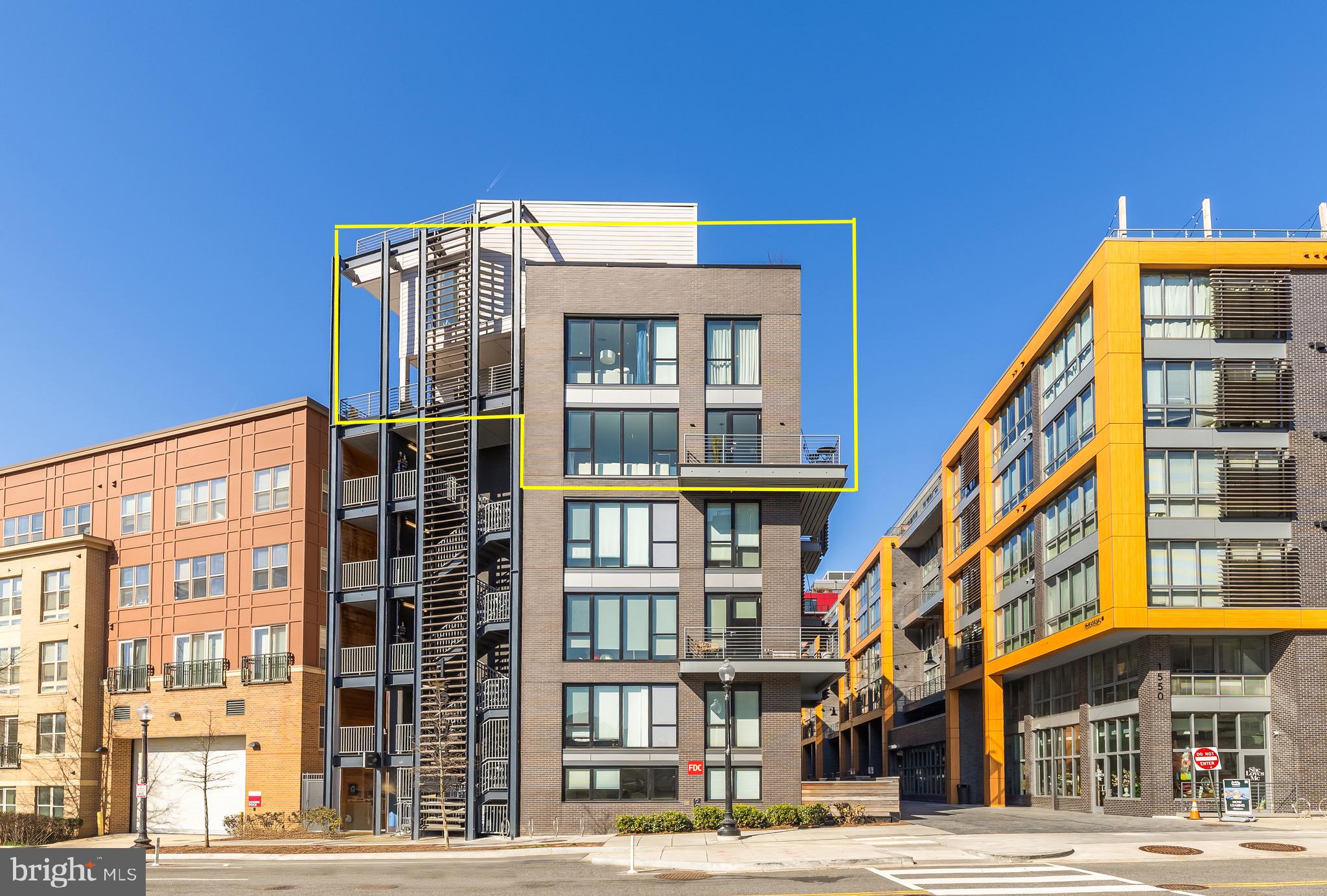 1500 Harry Thomas Way Northeast, Unit 501 Washington, DC 20002 - Photo 42 of 44 a front view of a building with a street