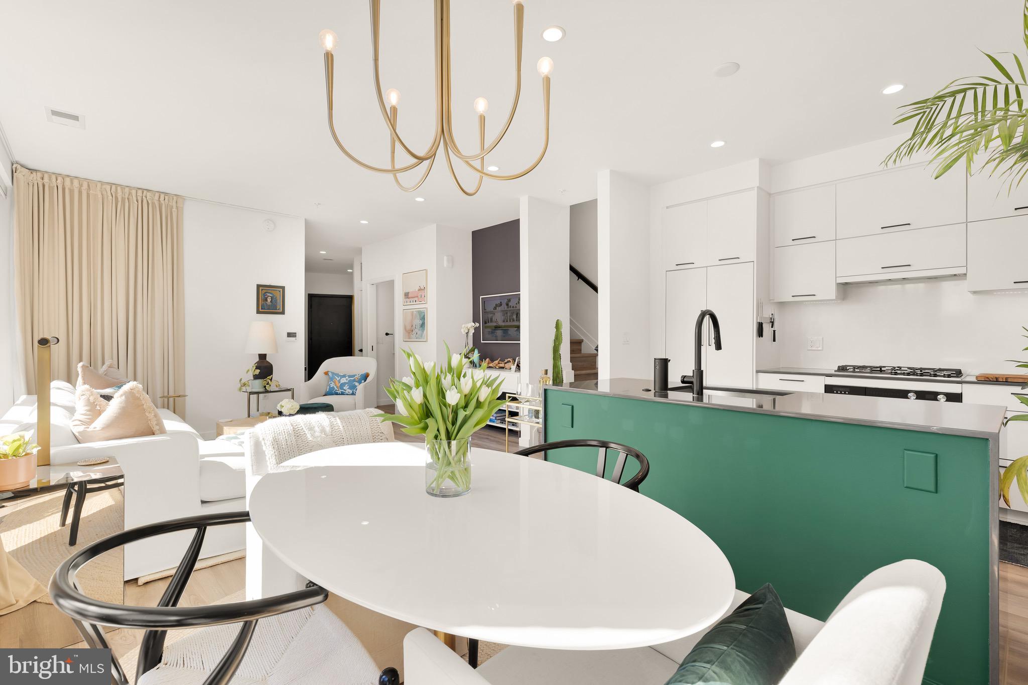 1500 Harry Thomas Way Northeast, Unit 501 Washington, DC 20002 - Photo 8 of 44 a view of kitchen with furniture and a potted plant