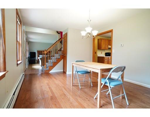 115 Fitzgerald Road Charlton, MA 01507 - Photo 11 of 24 a dining room with furniture and wooden floor