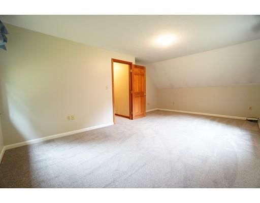 115 Fitzgerald Road Charlton, MA 01507 - Photo 17 of 24 a view of an empty room and wooden floor
