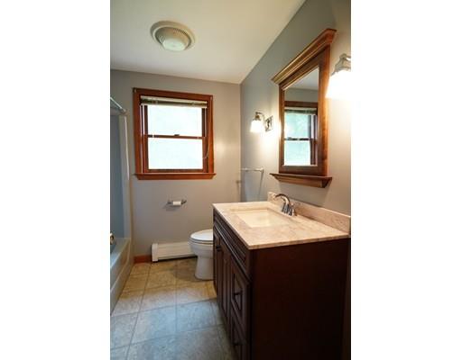 115 Fitzgerald Road Charlton, MA 01507 - Photo 18 of 24 a bathroom with a sink and a vanity