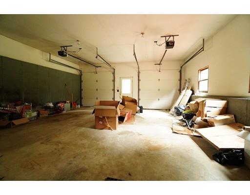 115 Fitzgerald Road Charlton, MA 01507 - Photo 22 of 24 a view of a room with gym equipment