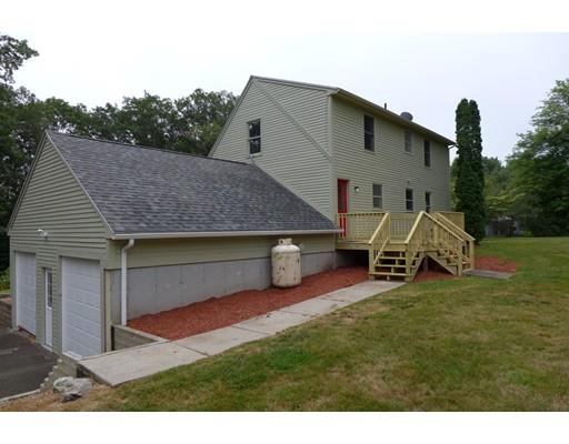 115 Fitzgerald Road Charlton, MA 01507 - Photo 3 of 24 a view of a house with a yard and sitting area