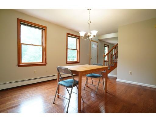 115 Fitzgerald Road Charlton, MA 01507 - Photo 10 of 24 a view of a dining room with furniture window and wooden floor