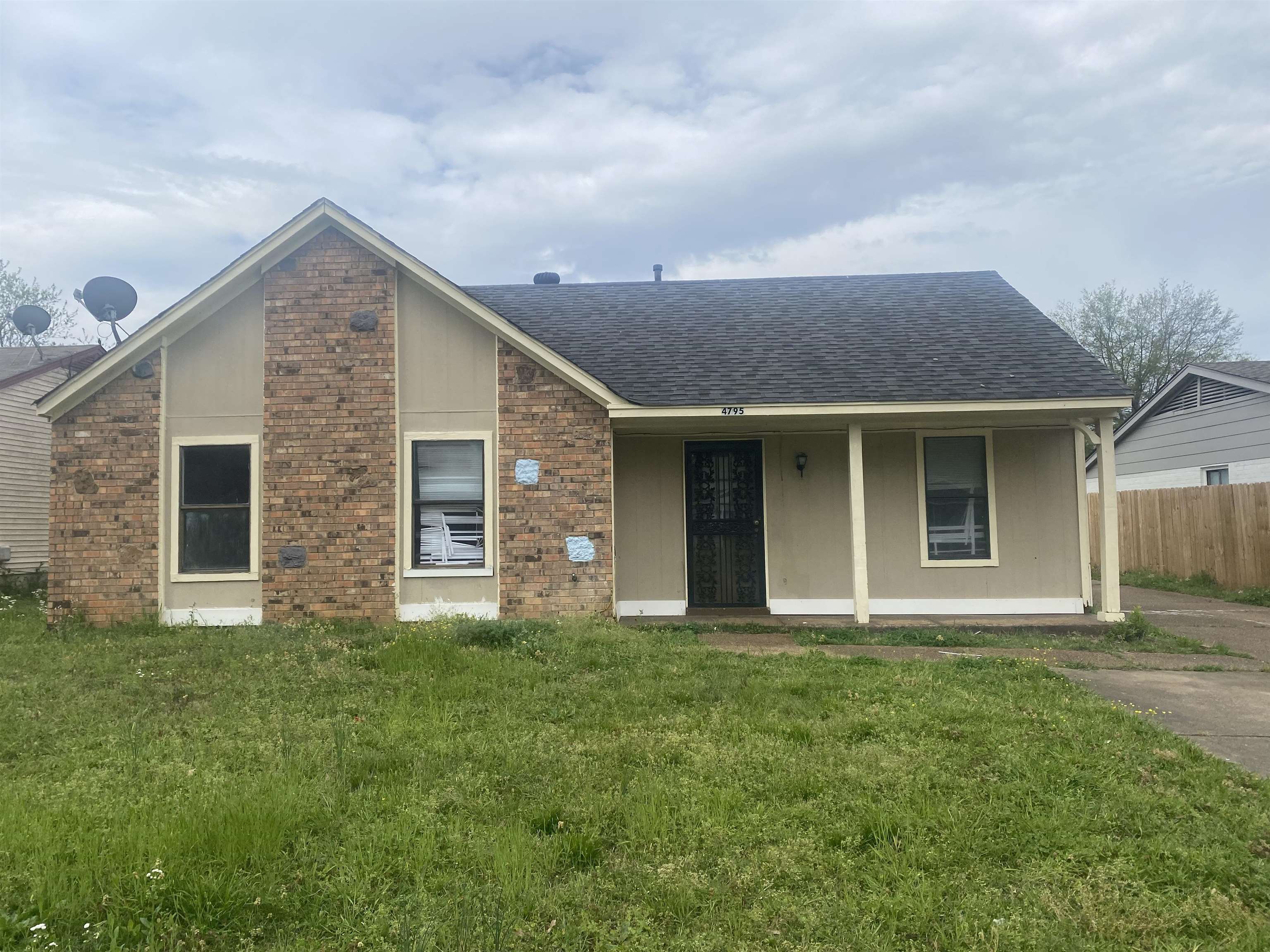 4795 Allrand Road Memphis, TN 38118 - Photo 1 of 21 front view of house with a yard