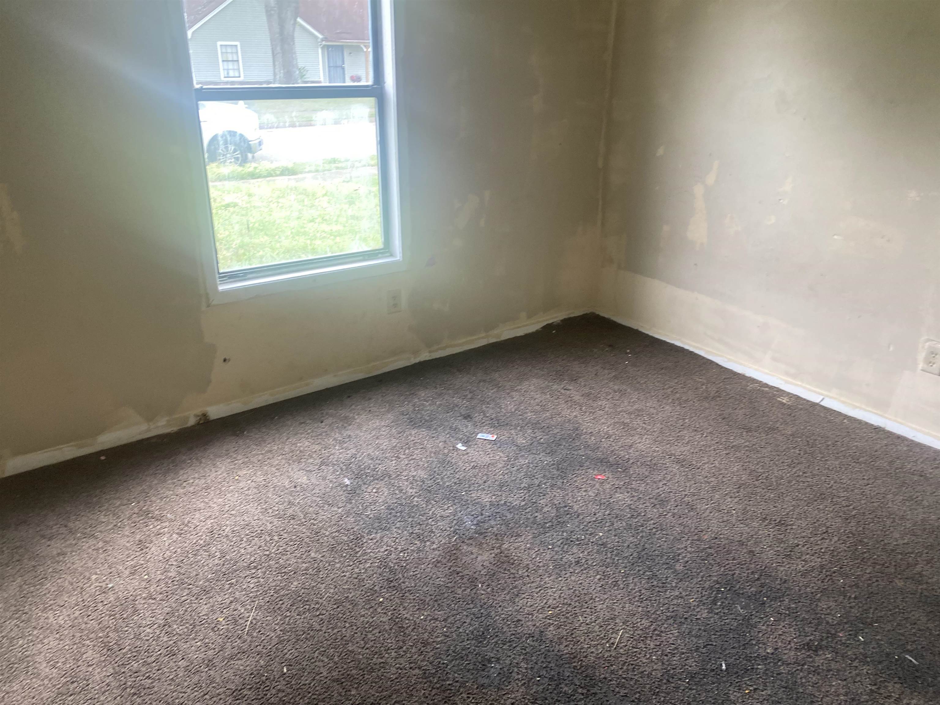 4795 Allrand Road Memphis, TN 38118 - Photo 11 of 21 an empty room with a window