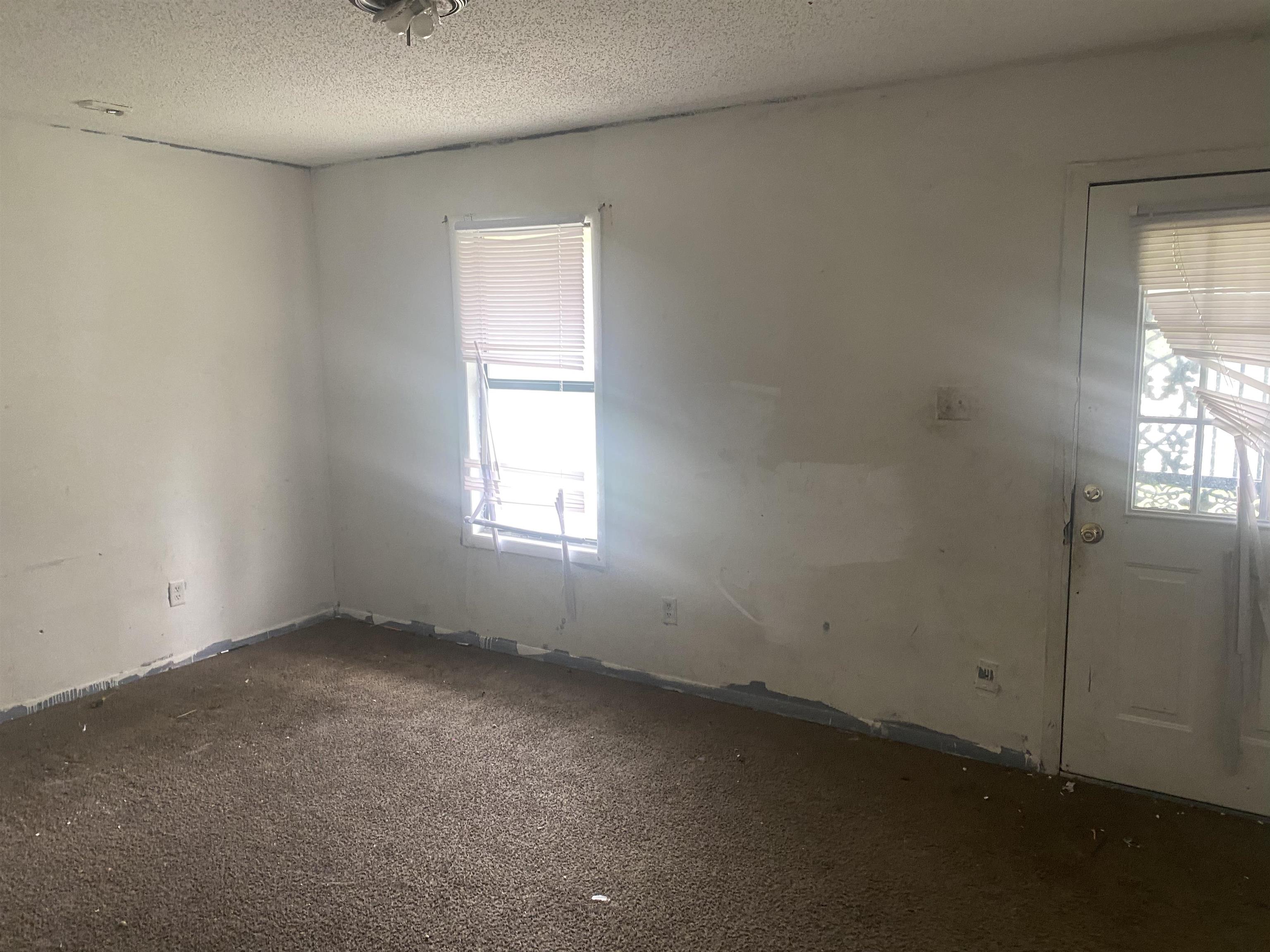 4795 Allrand Road Memphis, TN 38118 - Photo 7 of 21 an empty room with a window