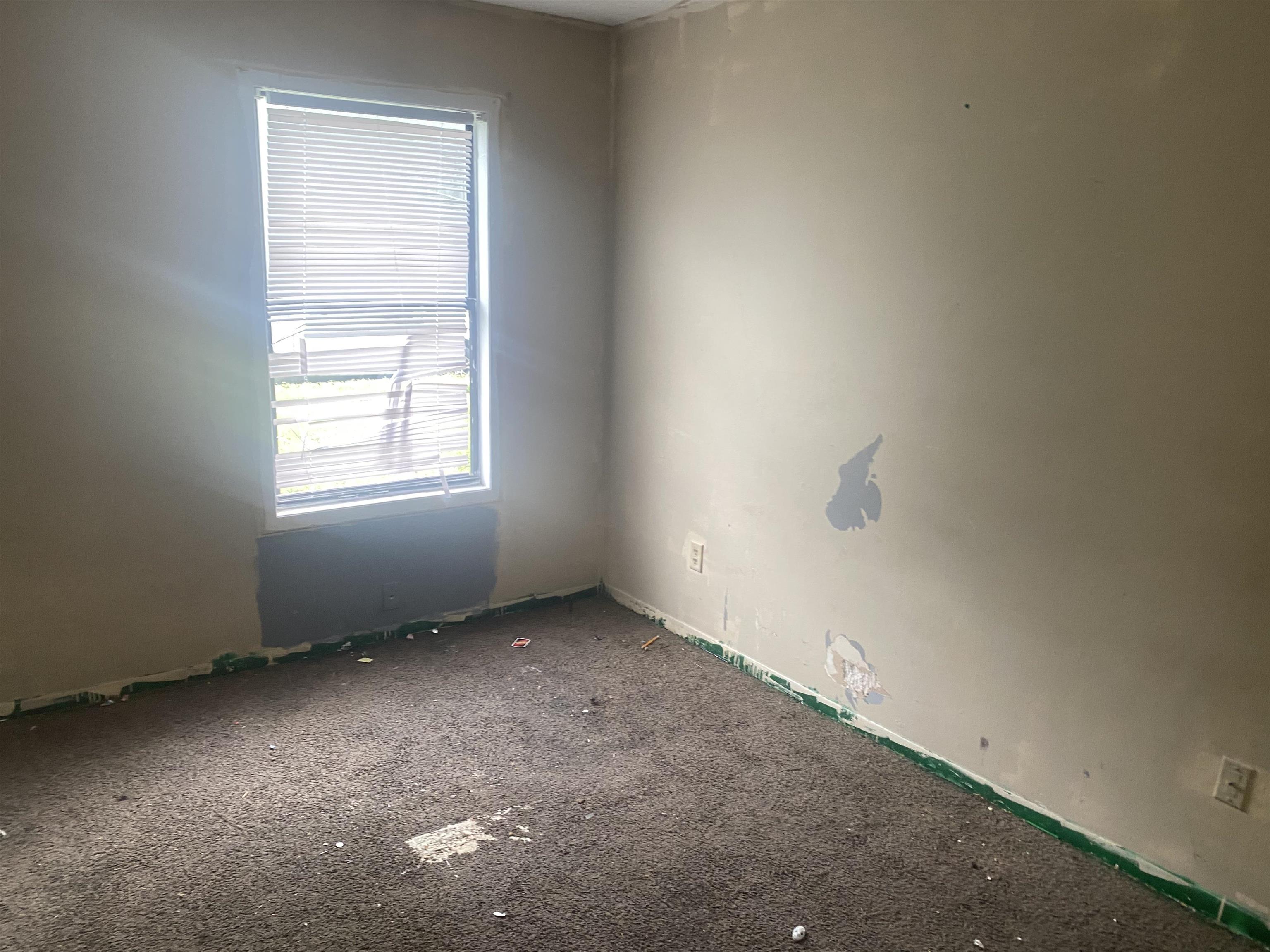 4795 Allrand Road Memphis, TN 38118 - Photo 9 of 21 an empty room with a window