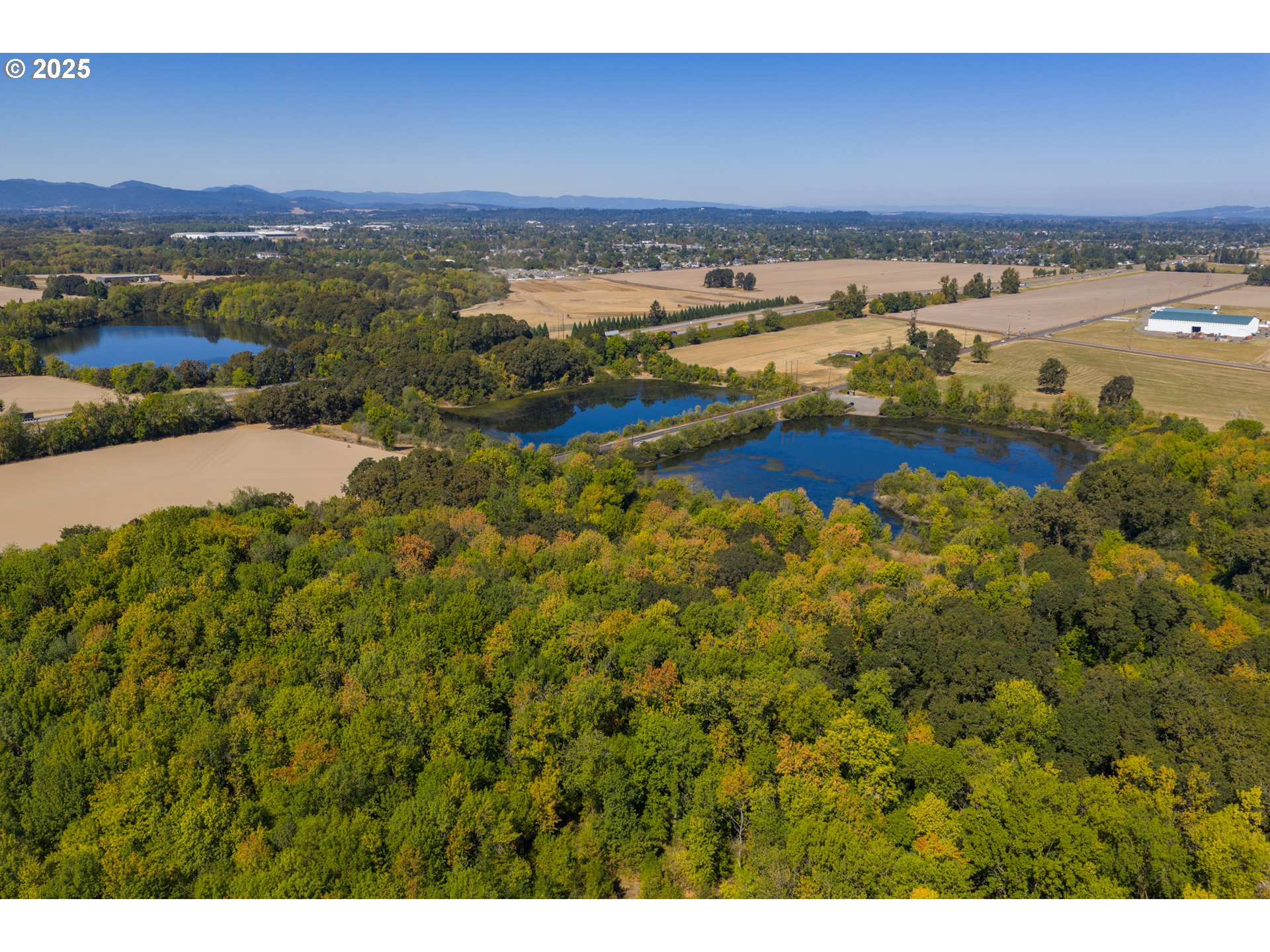 3 Lakes Road Southeast, Unit 200 Albany, OR 97322 - Photo 13 of 15 a view of a lake with a city