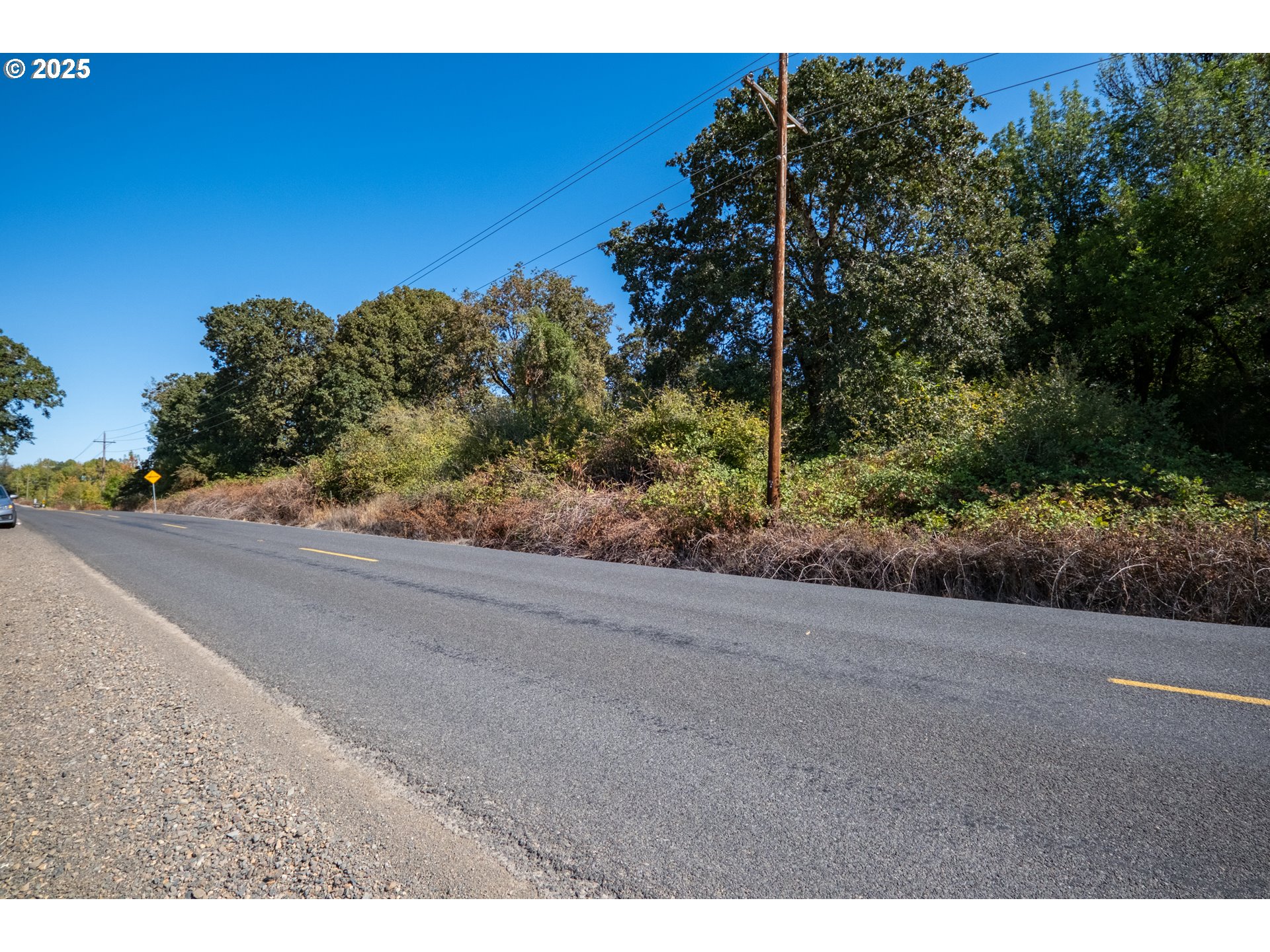 3 Lakes Road Southeast, Unit 200 Albany, OR 97322 - Photo 3 of 15 a view of a road with a building in the background