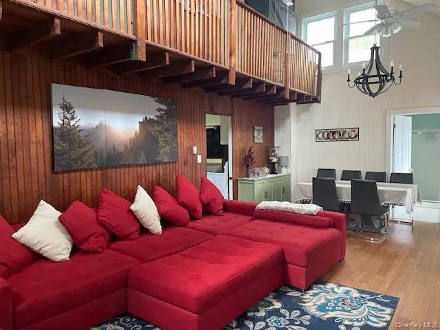 a bedroom with bed and a couch