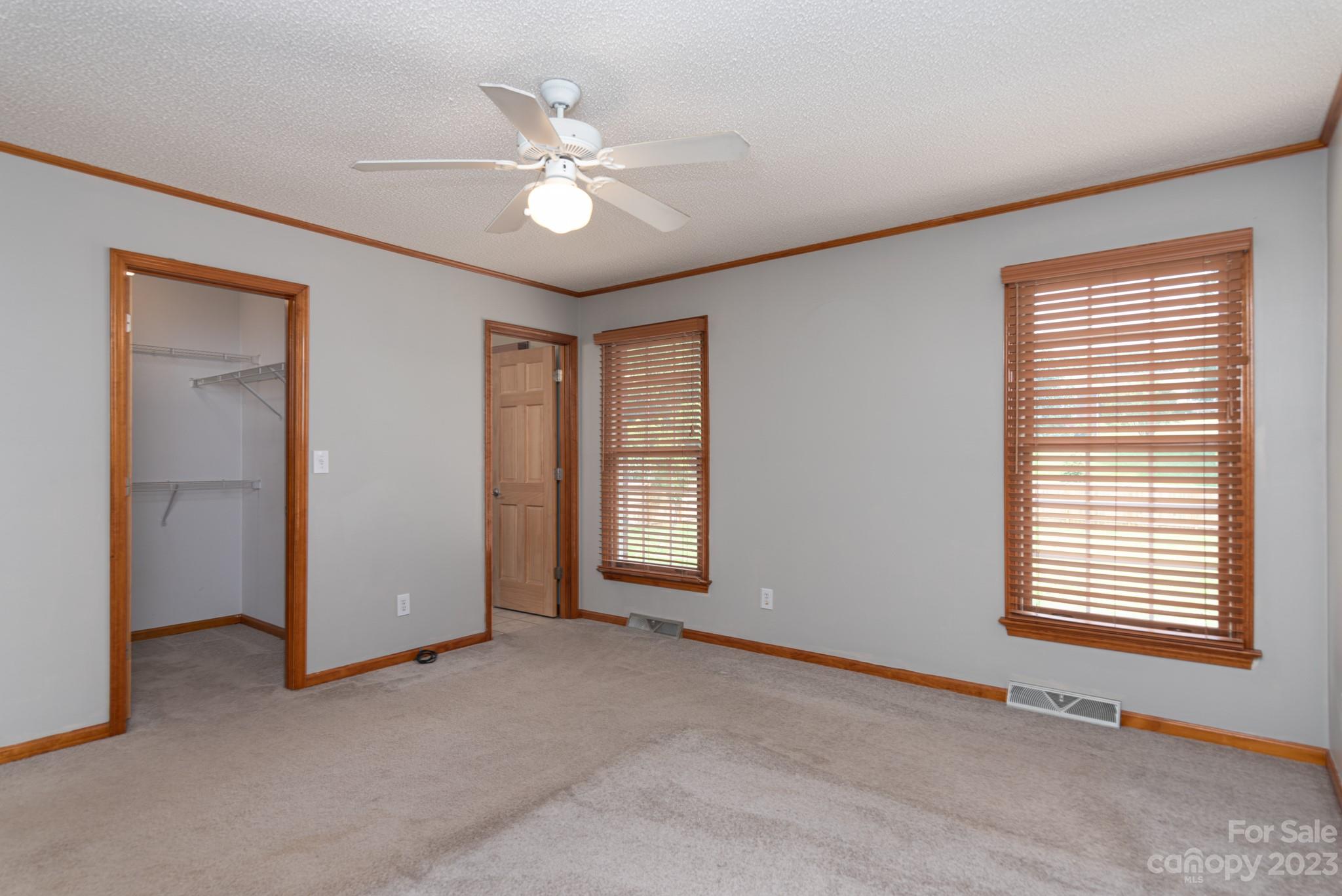 920 Bethel Church Road Lincolnton, NC 28092 - Photo 13 of 27 a view of a livingroom with a ceiling fan and window