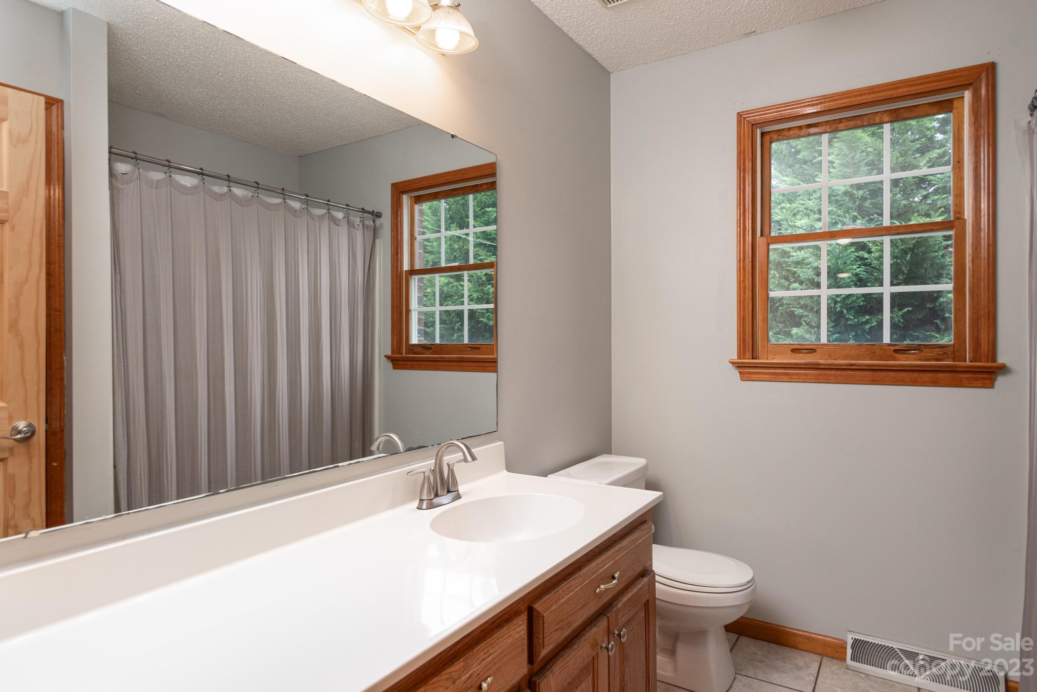 920 Bethel Church Road Lincolnton, NC 28092 - Photo 20 of 27 a bathroom with a sink toilet and vanity