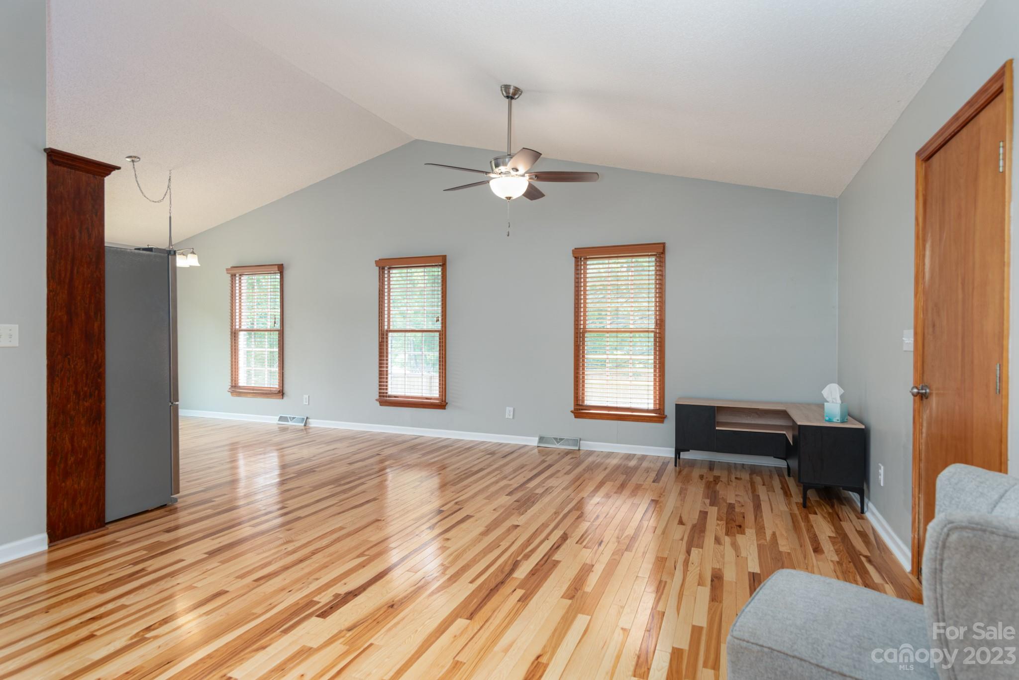 920 Bethel Church Road Lincolnton, NC 28092 - Photo 4 of 27 a view of an empty room with window and wooden floor