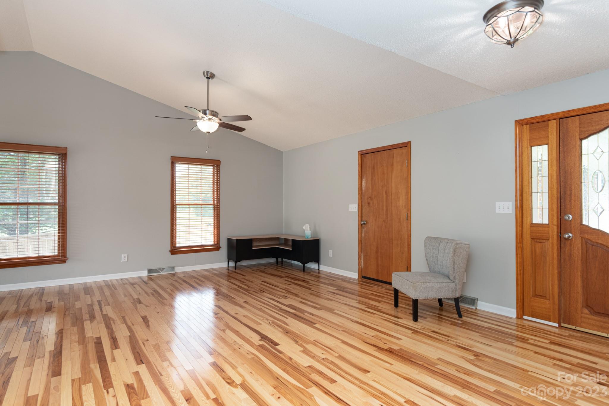 920 Bethel Church Road Lincolnton, NC 28092 - Photo 5 of 27 a view of a bedroom with wooden floor and a window