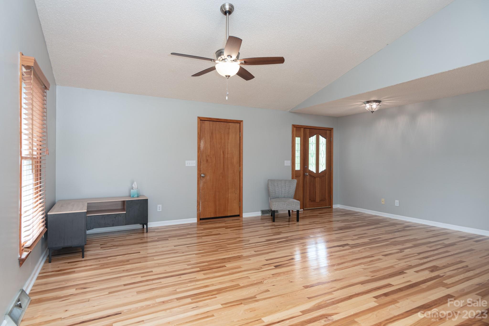 920 Bethel Church Road Lincolnton, NC 28092 - Photo 7 of 27 a view of livingroom with furniture and wooden floor