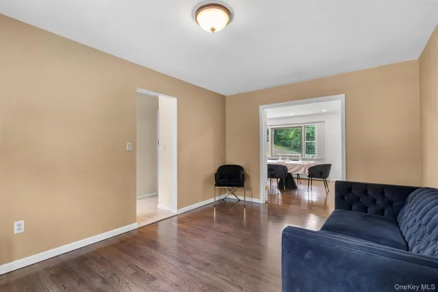 a living room with couches and a coffee table