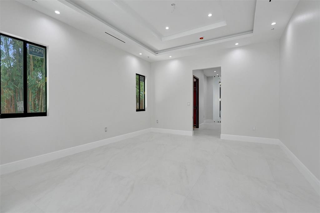 11951 Southwest 3rd Street Plantation, FL 33325 - Photo 28 of 59 an empty room with windows and closet
