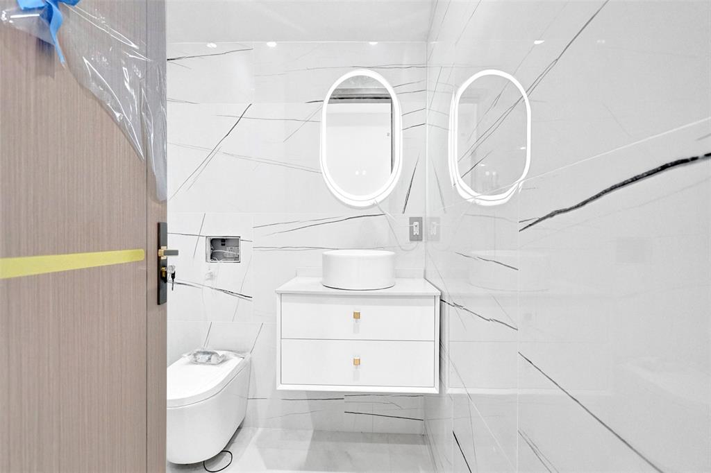 11951 Southwest 3rd Street Plantation, FL 33325 - Photo 39 of 59 a bathroom with a sink a toilet and shower