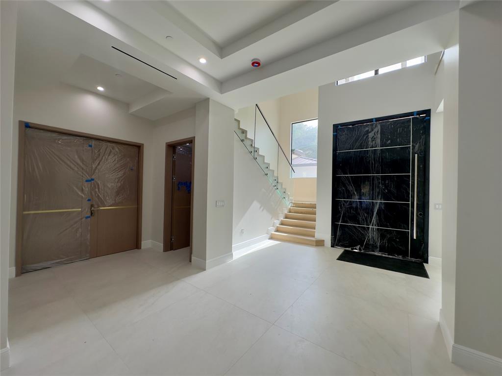 11951 Southwest 3rd Street Plantation, FL 33325 - Photo 40 of 59 a view of an empty room with a cabinet and a window