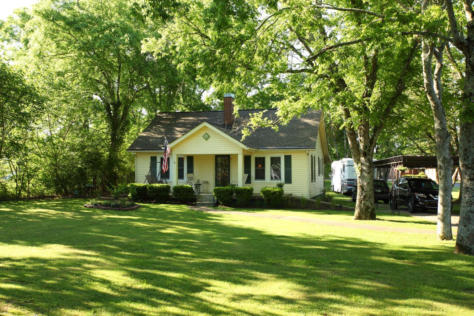 225 Franklin Road Lebanon, TN 37087 - Photo 1 of 21 a front view of a house with a yard