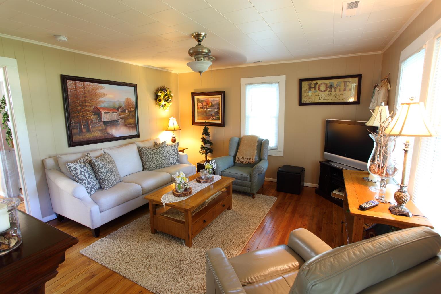 225 Franklin Road Lebanon, TN 37087 - Photo 2 of 21 a living room with furniture and a flat screen tv