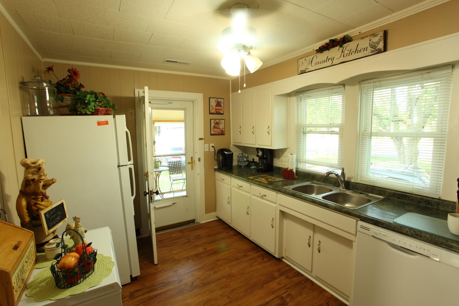 225 Franklin Road Lebanon, TN 37087 - Photo 12 of 21 a kitchen with sink a refrigerator and window