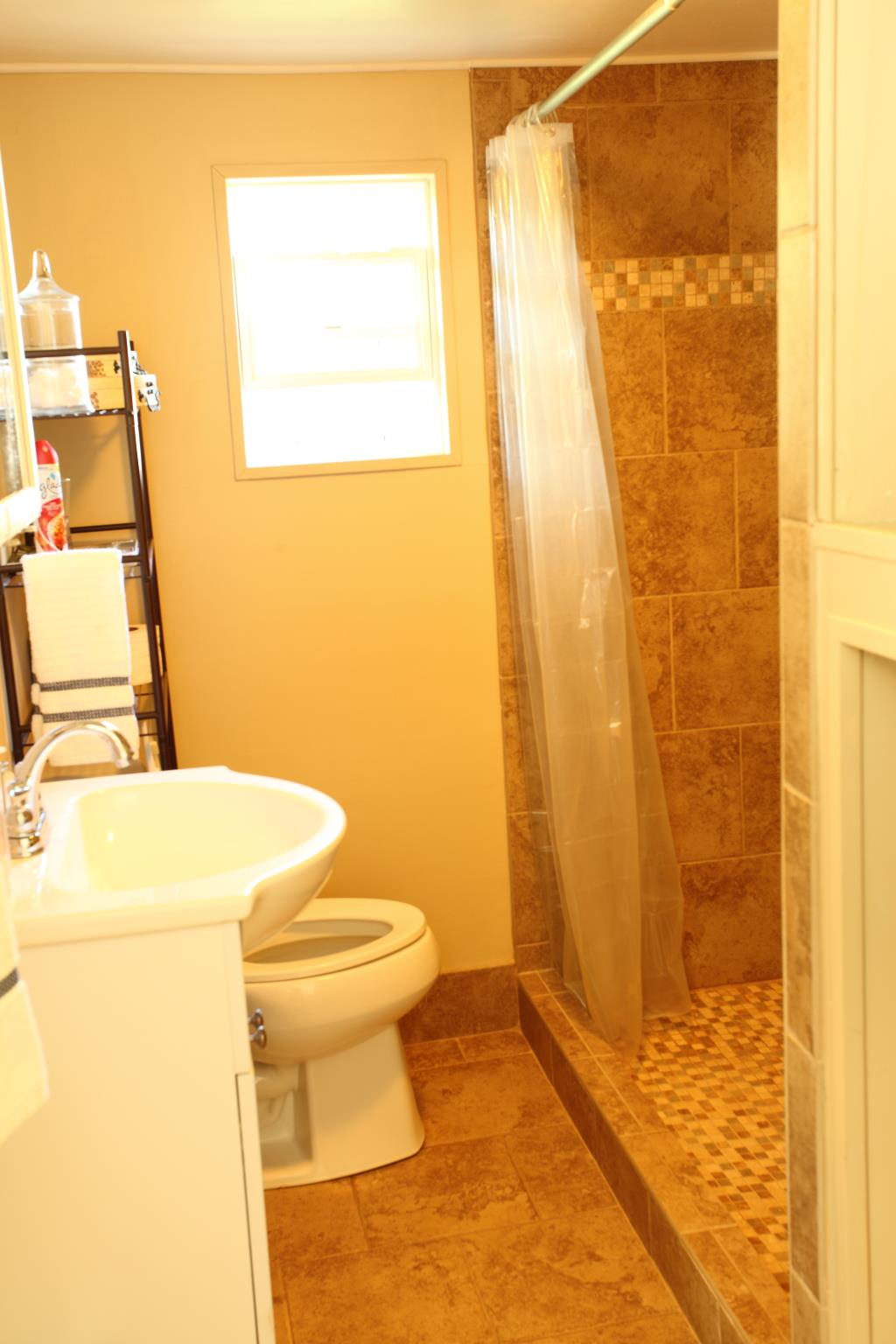 225 Franklin Road Lebanon, TN 37087 - Photo 7 of 21 a bathroom with a sink and a toilet