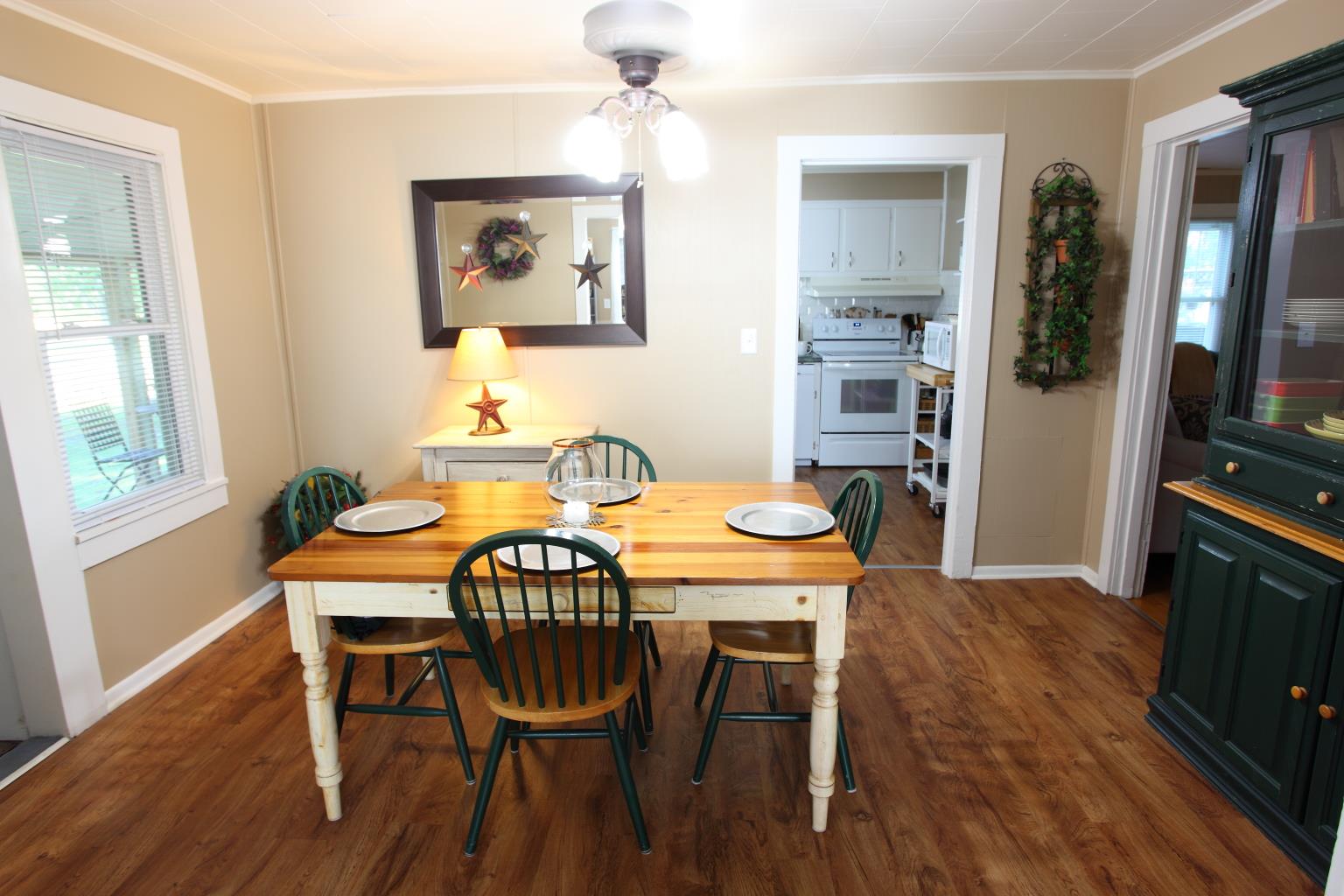 225 Franklin Road Lebanon, TN 37087 - Photo 10 of 21 a view of a dining room with furniture and wooden floor