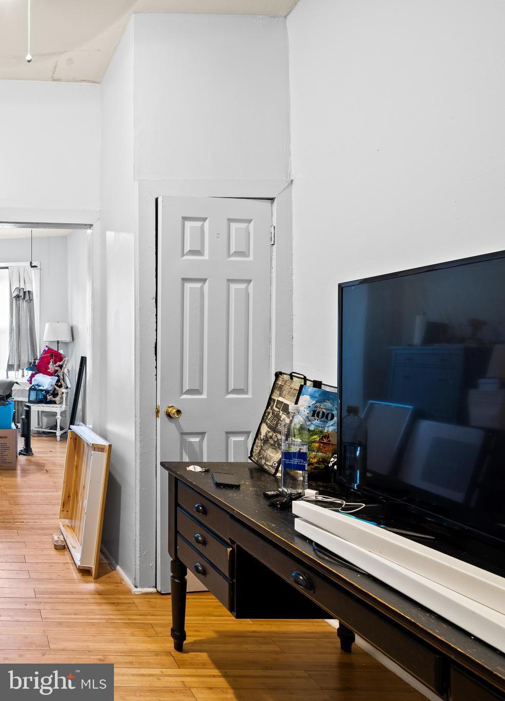 339 Christian Street, Unit 1 Philadelphia, PA 19147 - Photo 6 of 10 a living room with furniture and a flat screen tv