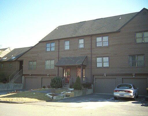 33 Stillmeadow Circle, Unit 33 Monroe, CT 06468 - Photo 1 of 1 a front view of a house with garden