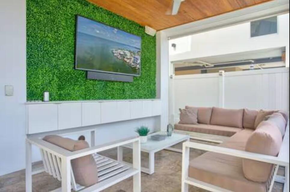 325 Calusa Street, Unit 231 Key Largo, FL 33037 - Photo 25 of 36 a living room with a couch and a window