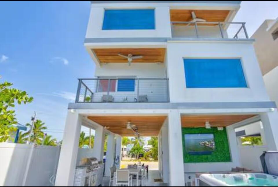 325 Calusa Street, Unit 231 Key Largo, FL 33037 - Photo 27 of 36 a front view of a house with outdoor