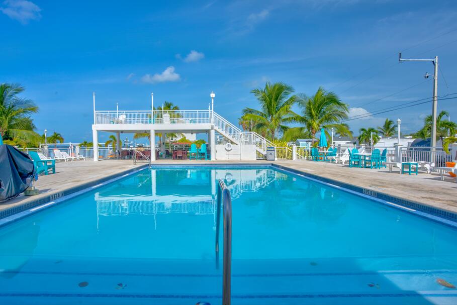 325 Calusa Street, Unit 231 Key Largo, FL 33037 - Photo 33 of 36 a view of a swimming pool with a patio