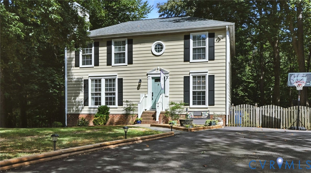 9743 Snowhill Road Richmond, VA 23235 - Photo 1 of 48 Colonial-style house with driveway and a shingled