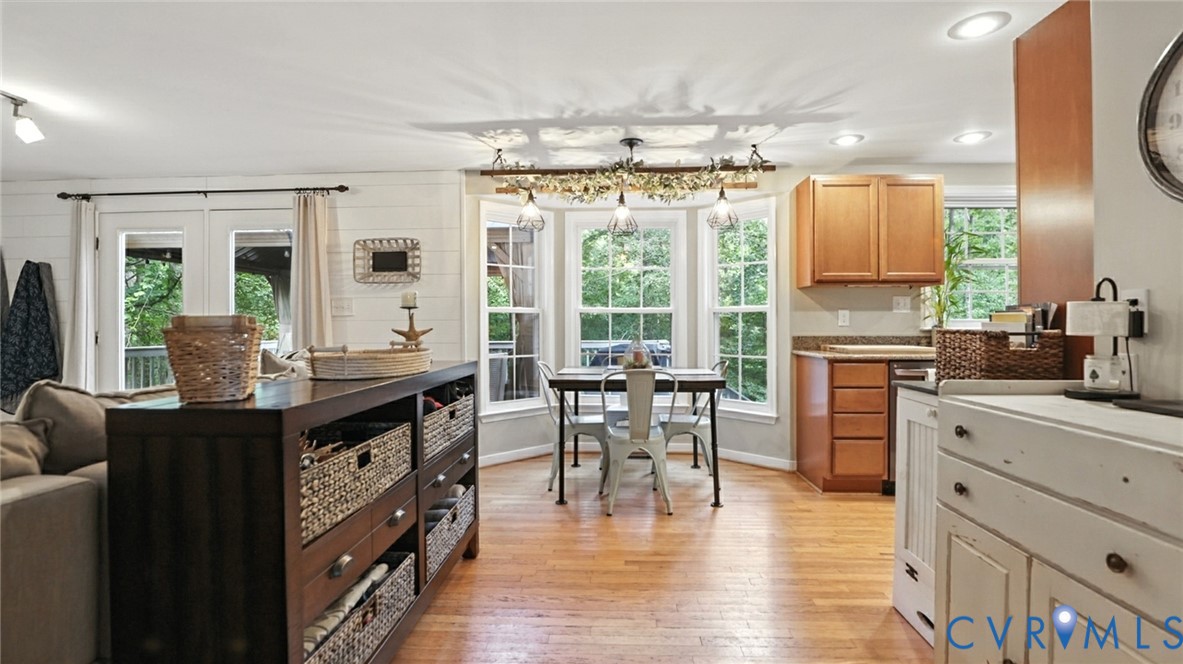 9743 Snowhill Road Richmond, VA 23235 - Photo 11 of 48 Kitchen with light wood-type flooring, brown cabin