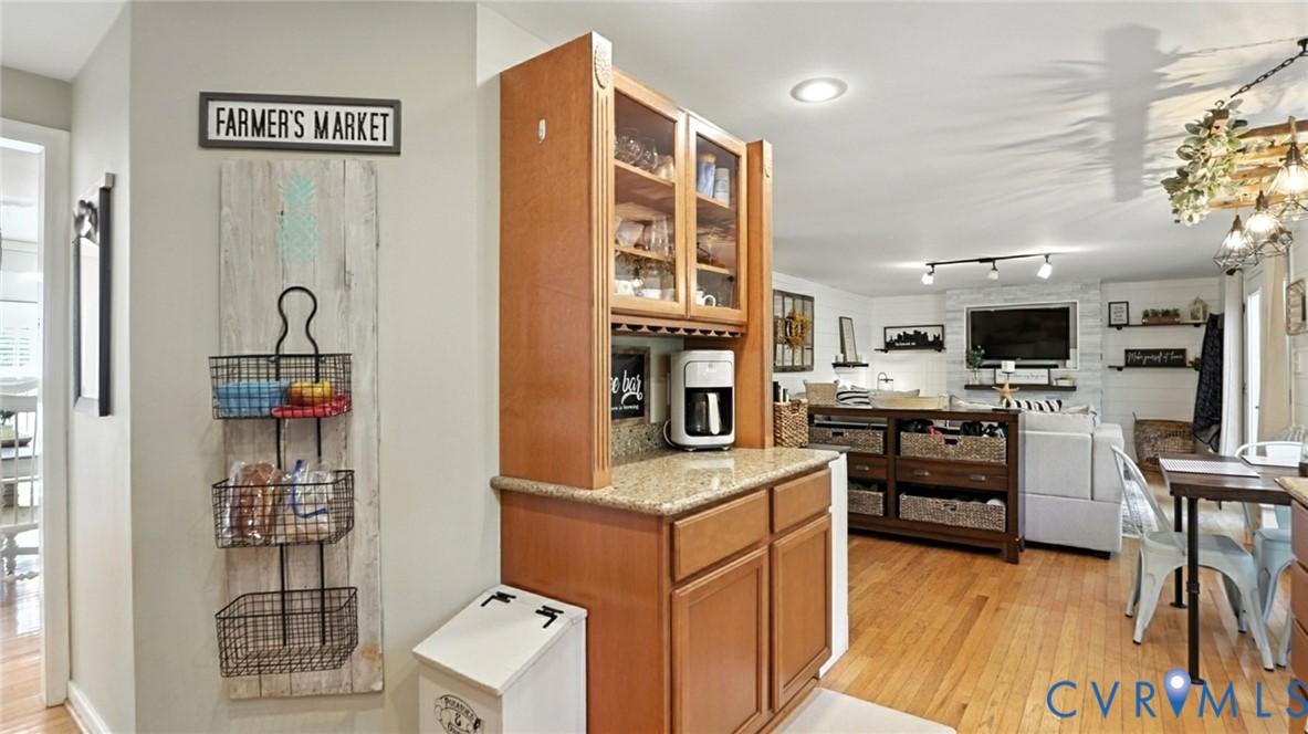 9743 Snowhill Road Richmond, VA 23235 - Photo 15 of 48 Kitchen with light wood-type flooring, brown cabin
